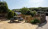 Beautiful little paved patio area at the front of the house. - Thumbnail Image