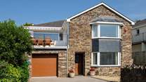 Dolphin House is a spacious detached house at the end of the cul-de-sac.