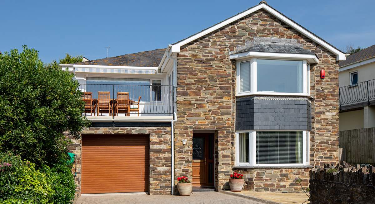 Dolphin House is a spacious detached house at the end of the cul-de-sac.