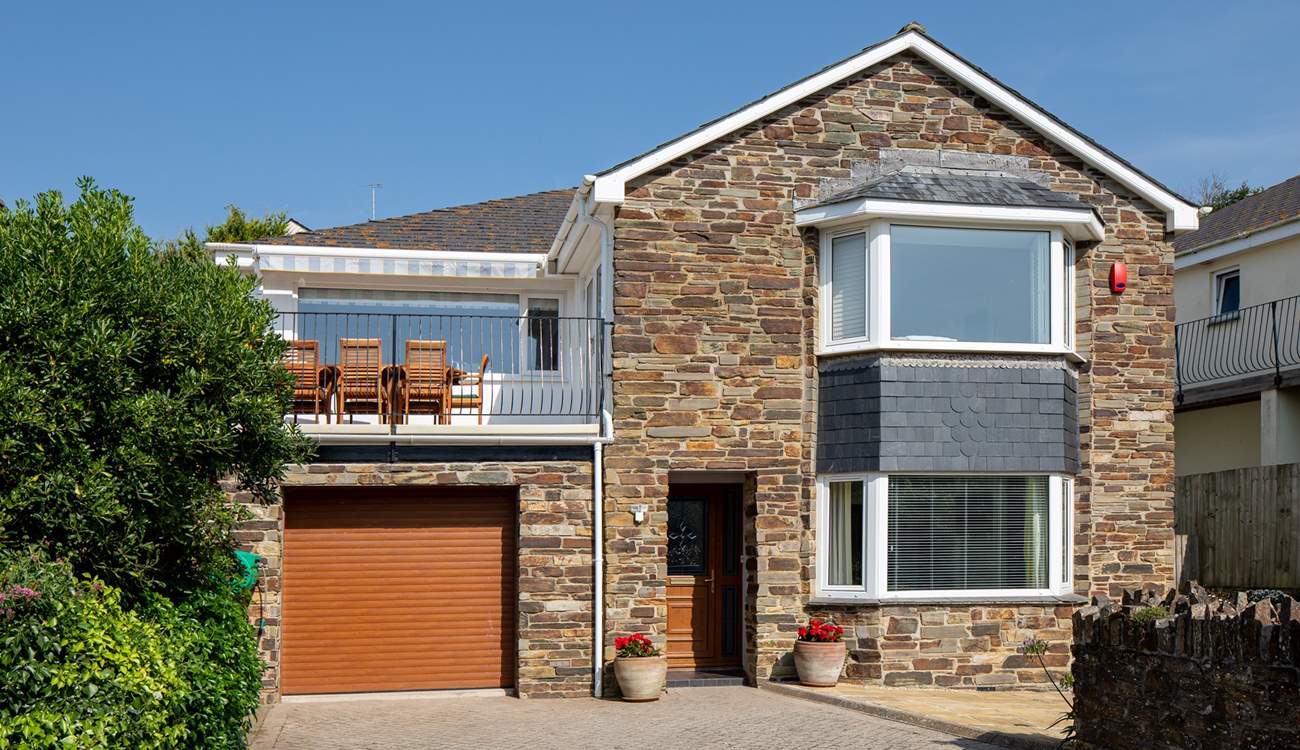 Dolphin House is a spacious detached house at the end of the cul-de-sac.