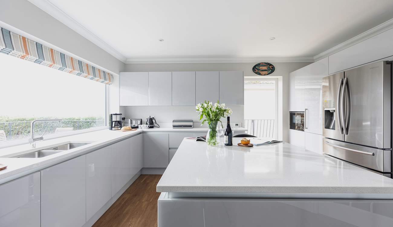 The kitchen is fully equipped with all mod-cons and offers oodles of space to whip up a feast.