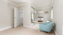 The master bedroom also has this fabulous dressing area/office space. Also the perfect space for a cot.