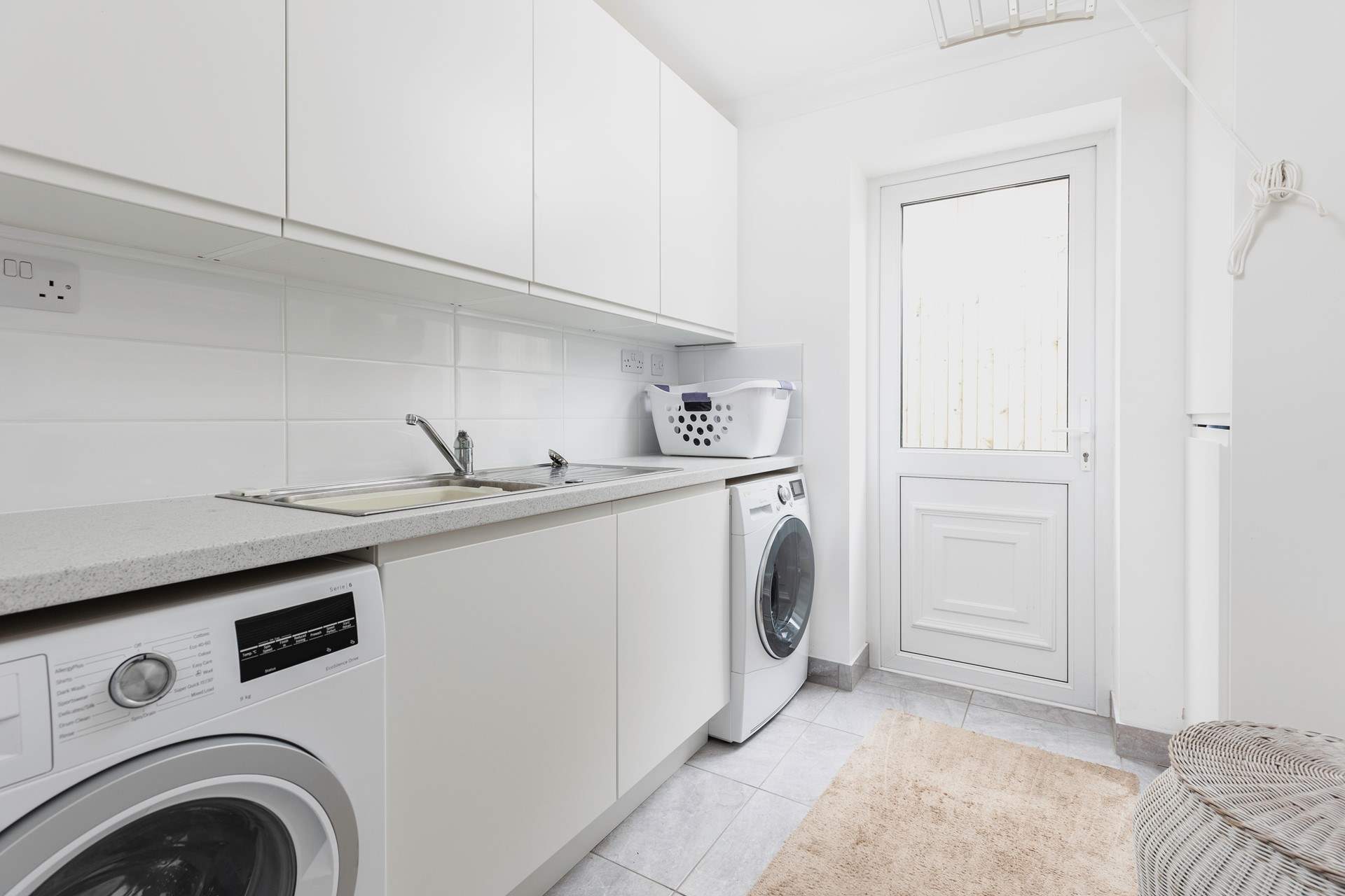 The separate utility room on the ground floor.