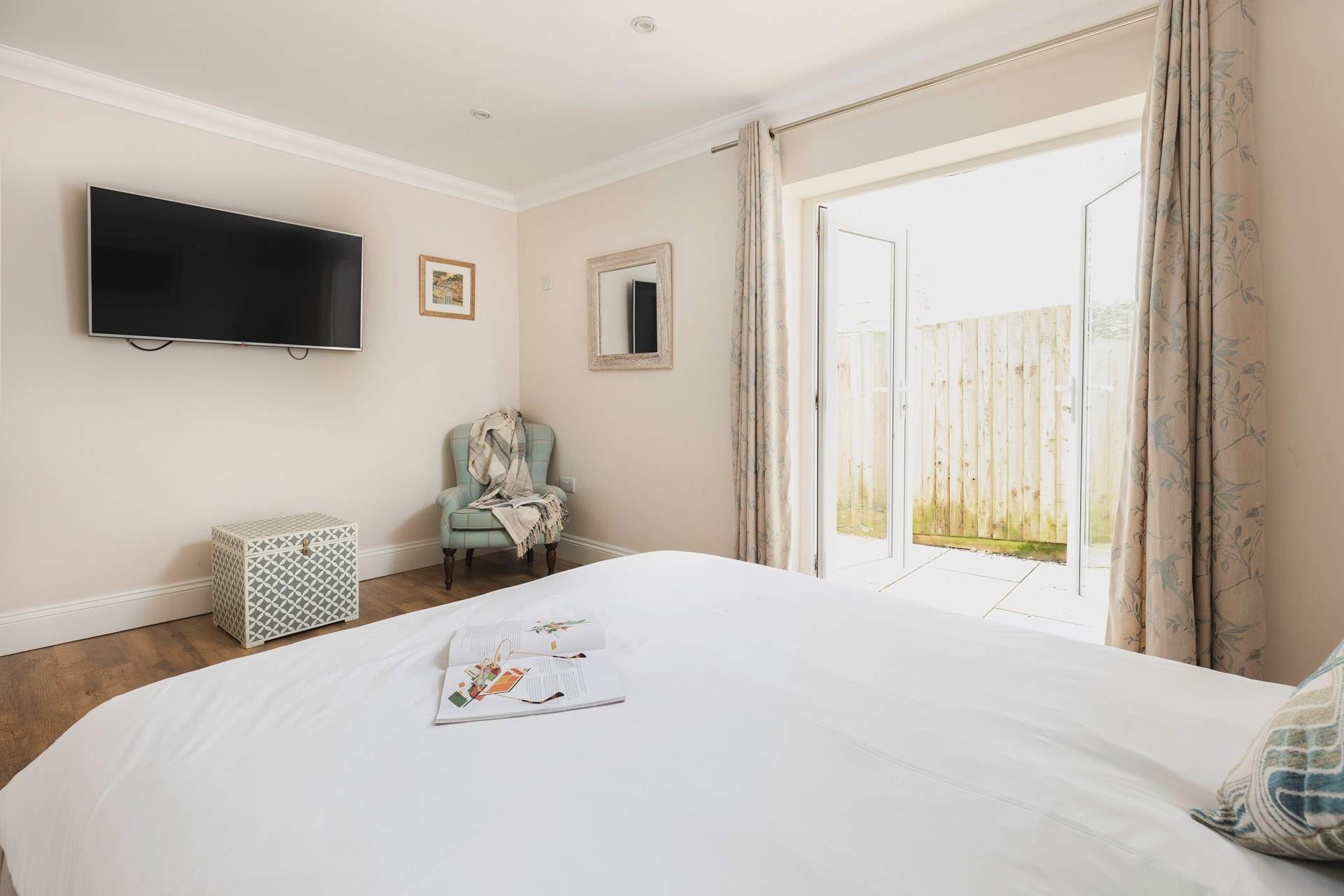 Pretty bedroom 3 has access to the patio.