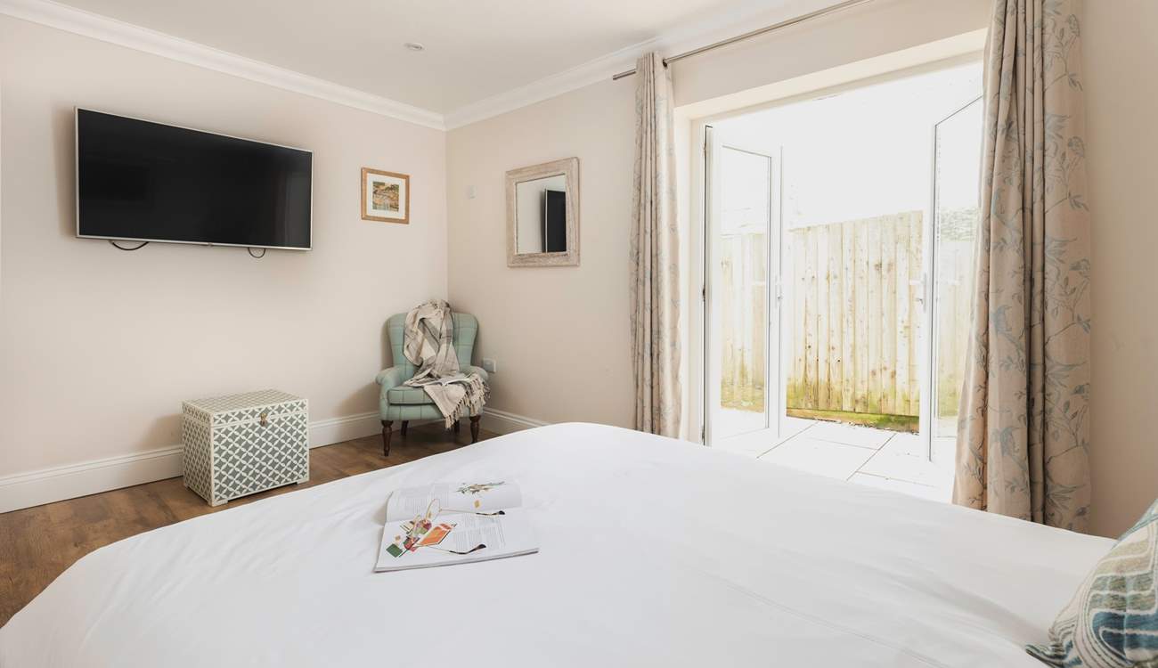 Pretty bedroom 3 has access to the patio.