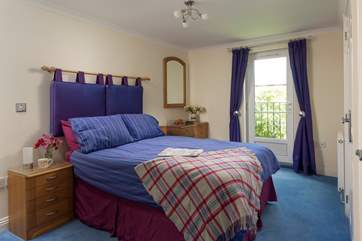The master bedroom is at the back of the property (Bedroom 1).