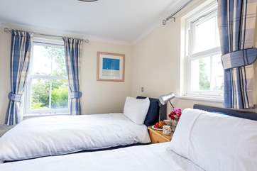 The twin bedroom also overlooks the communal garden at the back of the property.