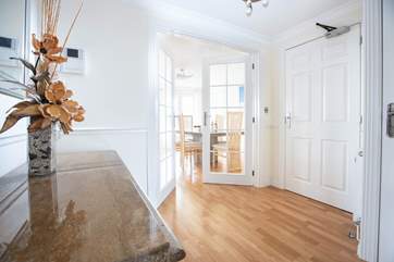 The large entrance hall is the perfect place for all your holiday clobber.