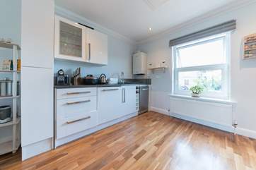 The well-equipped kitchen area on the first floor.