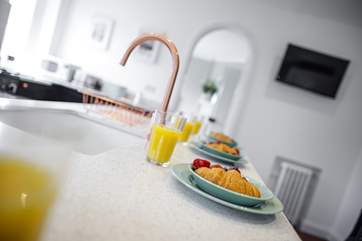 The kitchen also offers an additional spot to watch the rugby on a weekend.