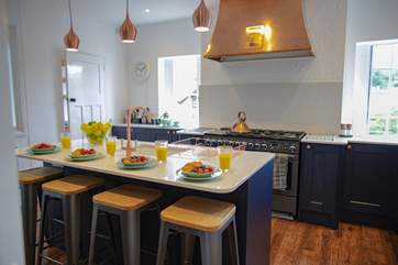 The original hood sits proudly in the newly fitted kitchen.