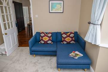The snug sofa, the perfect place to zone out.