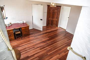 The study-area to the side of the spacious hall.