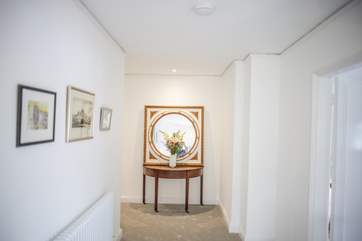 The first floor landing links all bedrooms and the main bathroom.