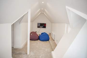 With four bean bags the games-room offers a PlayStation plus the perfect hangout zone for the younger members of the family.