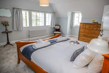 The master en suite bedroom offers a wonderfully large room, beautifully decorated in prime position to enjoy the views both up and down the estuary.