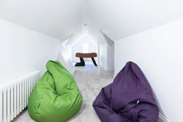 On the second floor you will find the games room with a PlayStation and...