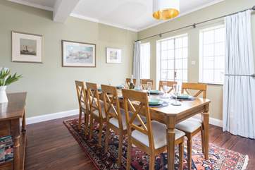 The dining-area offers the perfect table to come together at the end of the day. The patio doors give you access to the garden and patio area.