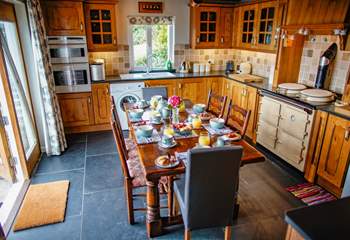 Breakfast in style! The kitchen also has a 2 ring electric hob as well as the oven if you are not used to an Aga.