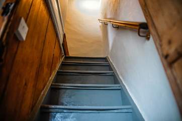 The stairs up to the first floor are steep but benefit from a handrail with a door that can be shut on the ground level.