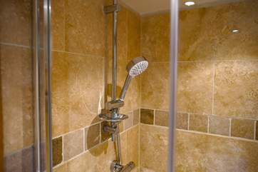 A wonderfully fitted en suite shower-room to complement the double downstairs bedroom.