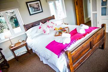 The bed has been positioned to take in the wonderful views.