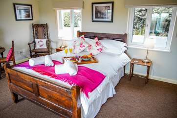 The master bedroom benefits from dual-aspect windows allowing the room to bathe in light, but most importantly make breakfast with a view one to remember.