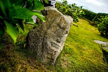 Be sure to set the children the challenge of finding the stone face in the garden. Please note the garden has lots of different levels and there is a drop around the extension to the back of the house.