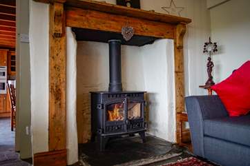 Whilst a storm is brewing outside the fire will keep one and all warm.