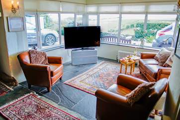 From the wood-burner end step down into the TV area.