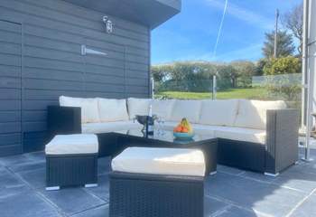 Step out of the kitchen patio doors and enjoy this perfect seating area.  Soak in the view after a day of exploring or listen to the dawn chorus as the family sleeps.  