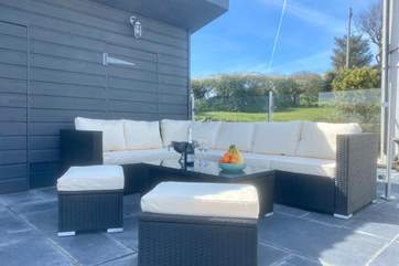 Step out of the kitchen patio doors and enjoy this perfect seating area. Soak in the view after a day of exploring or listen to the dawn chorus as the family sleeps.