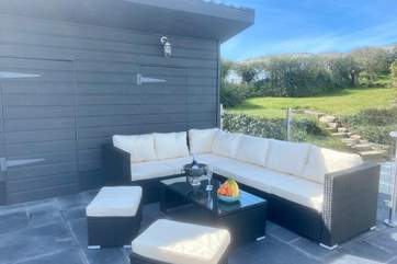 One of three seating options all making the most of the views and the garden.
