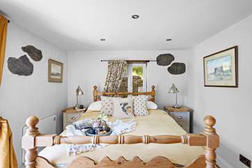 Bedroom 2 is a charming room.
