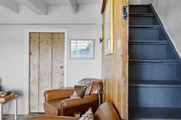 The stairs up to the first floor are steep but benefit from a handrail with a door that can be shut on the ground level.