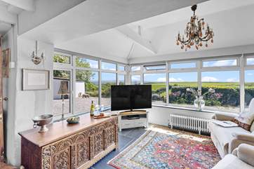 From the wood-burner end step down into the TV area or just soak up the view.