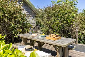 At the top of the garden you will discover a lovely picnic table.