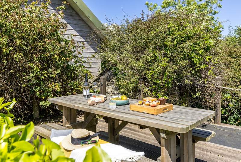 At the top of the garden you will discover a lovely picnic table.

