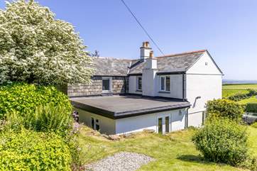 Lower St Winnolls only has one neighbour but you are totally secluded and will enjoy the open space and views.