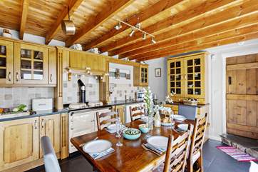 From the kitchen you can walk out on to the garden or through to the sitting room.