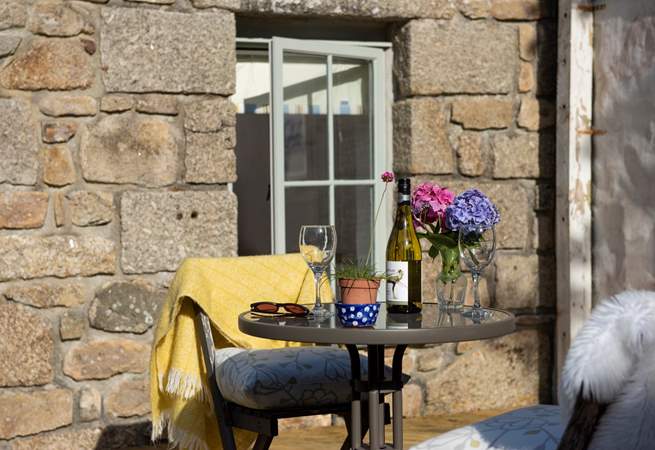 Enjoy a glass of wine on the south-facing terrace. 
