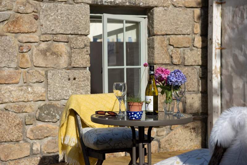 Enjoy a glass of wine on the south-facing terrace. 