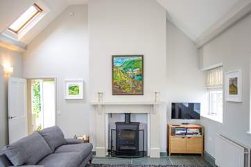 The vaulted ceiling and Velux windows means this area floods with light.