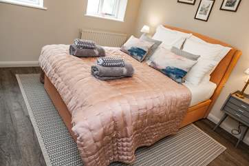 Bedroom 1 offers a wonderfully positioned room and benefits from an en suite shower-room. With two windows the room also floods with light.