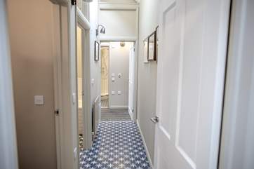 The hall leads through to bedrooms 1 and 2, with the main bathroom situated between the bedrooms, this area benefits from under-floor heating.
