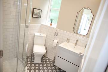 The shower-room benefits from under-floor heating and is situated next to bedroom 3.