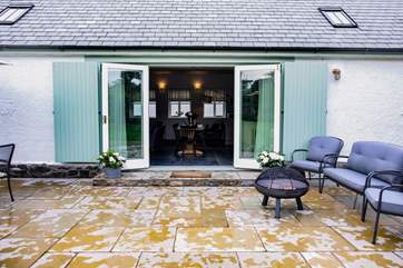 The patio doors open up on to the patio and your secluded enclosed garden.