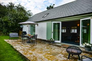 The patio area offers the perfect spot for the family to enjoy the fresh area and the rural setting.
Please note there are steps up to the main patio area from the parking /drive area.