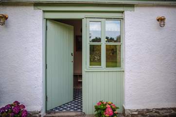 The front door into the cottage opens up into the hallway.