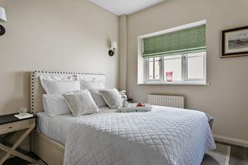 The double glazed windows flood bedroom 3 with natural light.